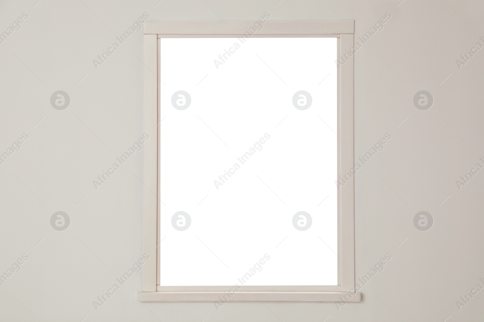 Photo of White wall with modern window indoors. Element of interior