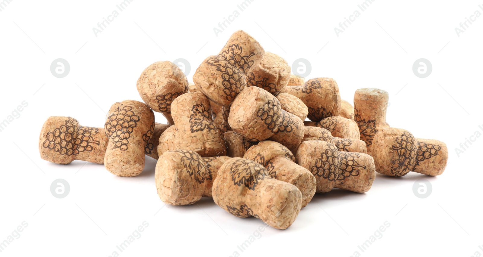 Photo of Heap of sparkling wine corks on white background