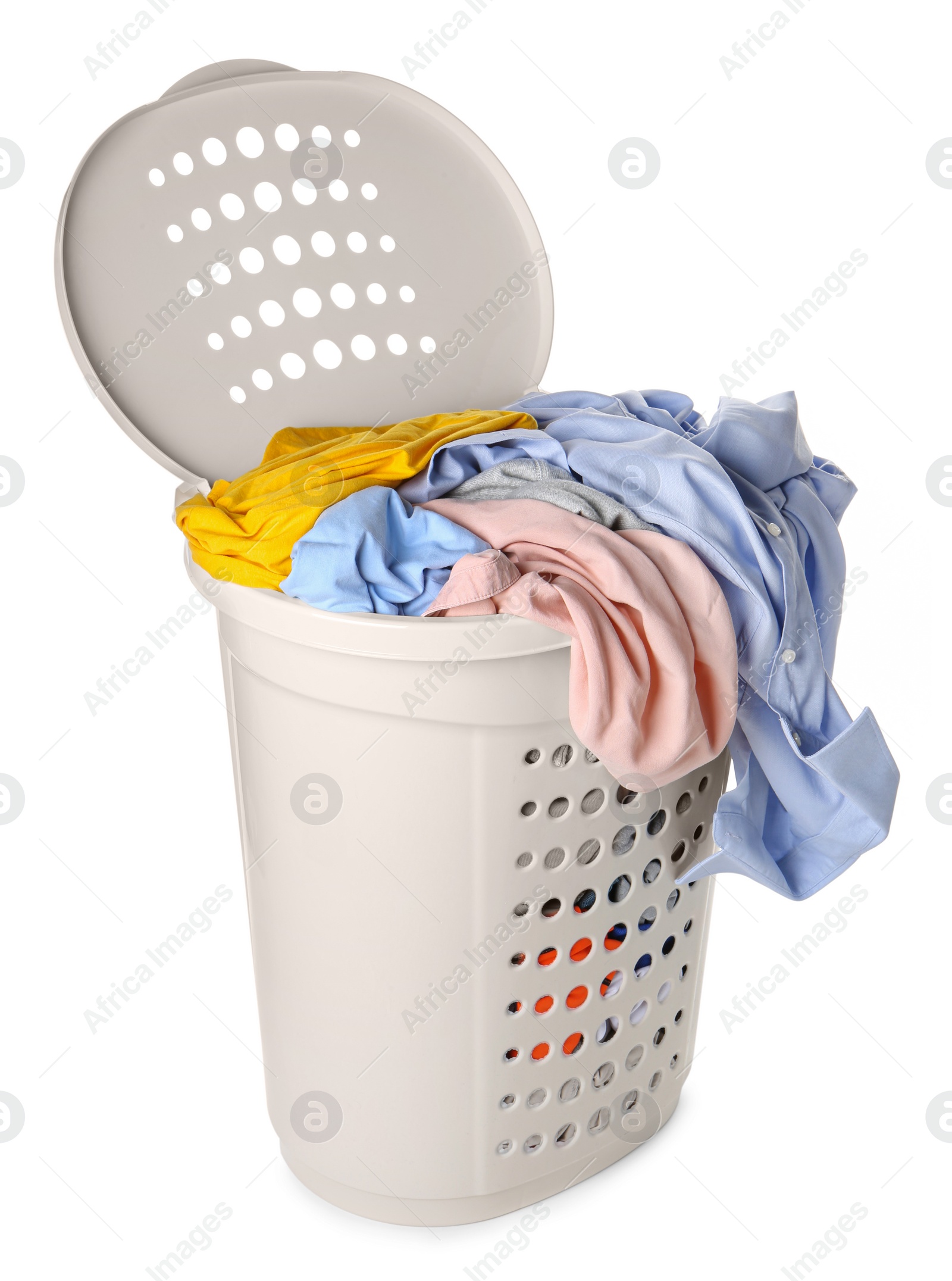 Photo of Plastic laundry basket full of clothes isolated on white