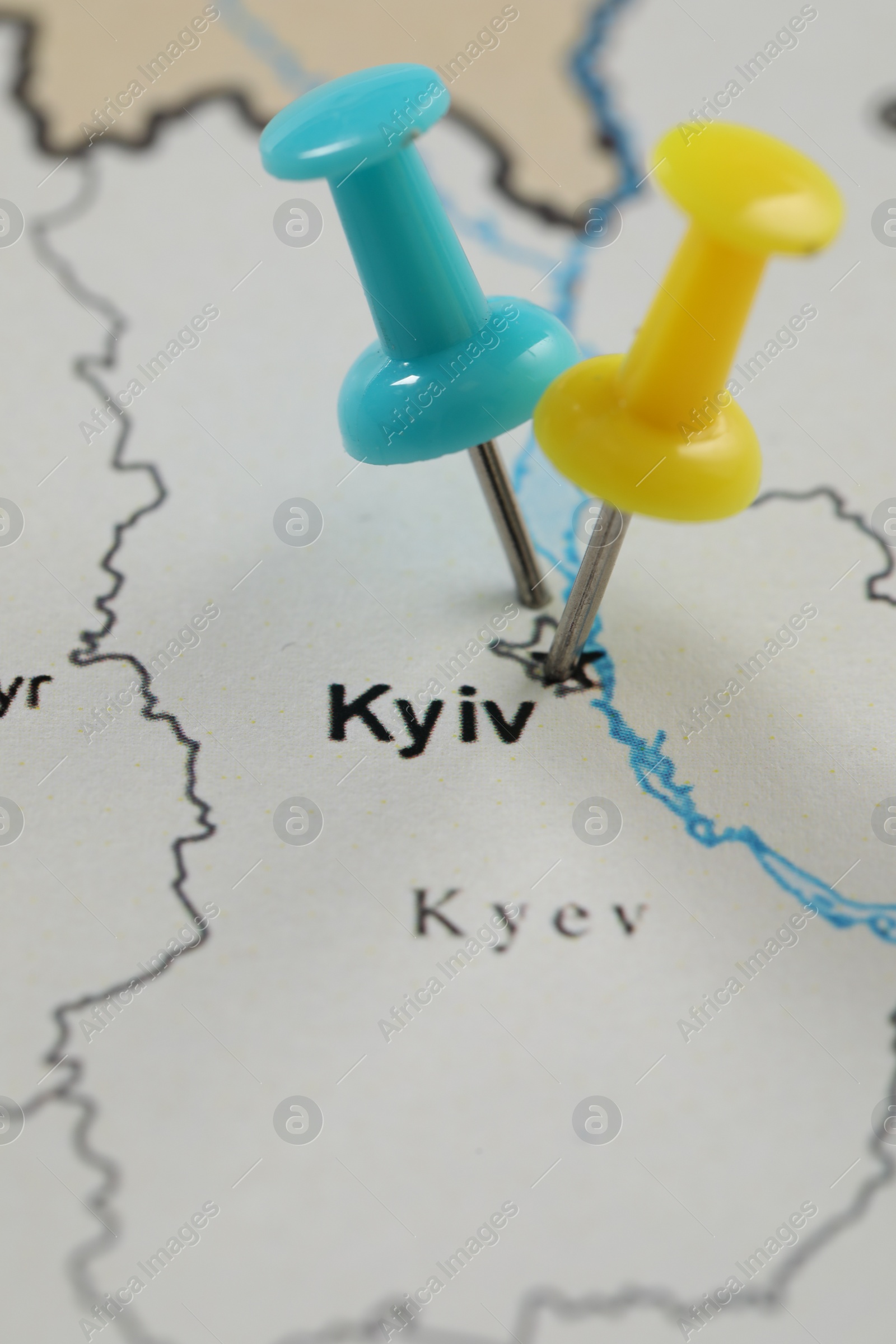 Photo of MYKOLAIV, UKRAINE - NOVEMBER 09, 2020: Kyiv city marked with push pins on contour map of Ukraine, closeup