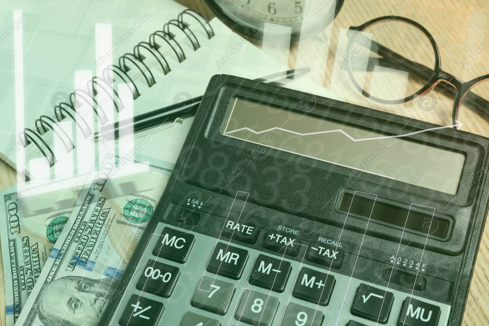 Image of Calculator, money and stationery on table, closeup