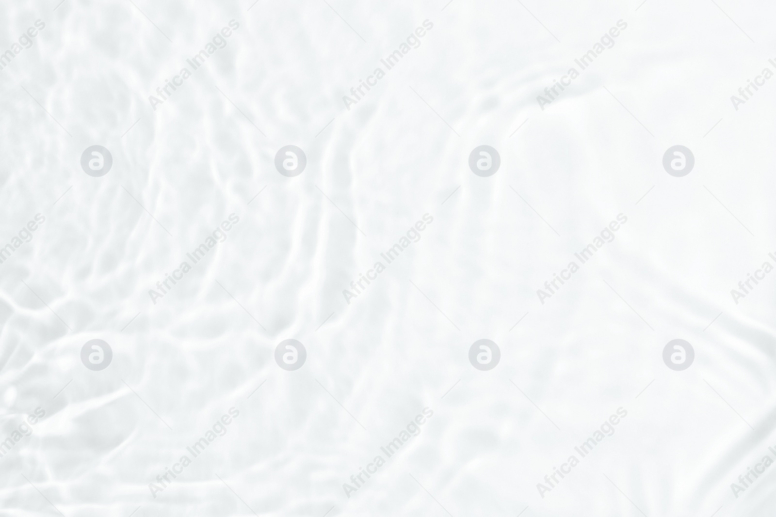 Image of Closeup view of water with ripples on white background