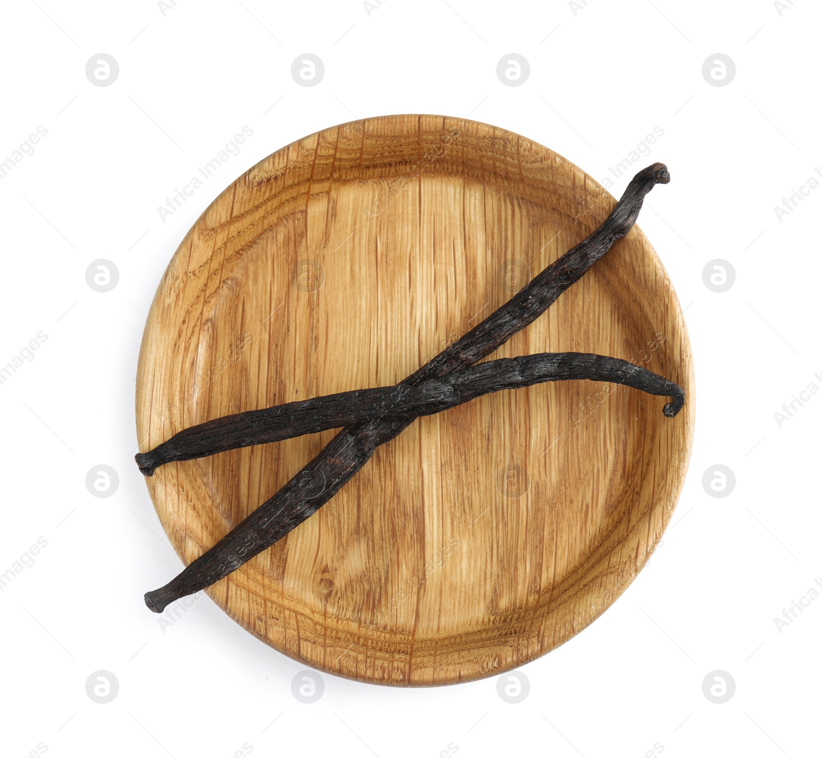 Photo of Wooden plate with aromatic vanilla sticks on white background, top view