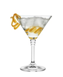 Photo of Glass of classic martini cocktail with ice cubes and lemon zest on white background