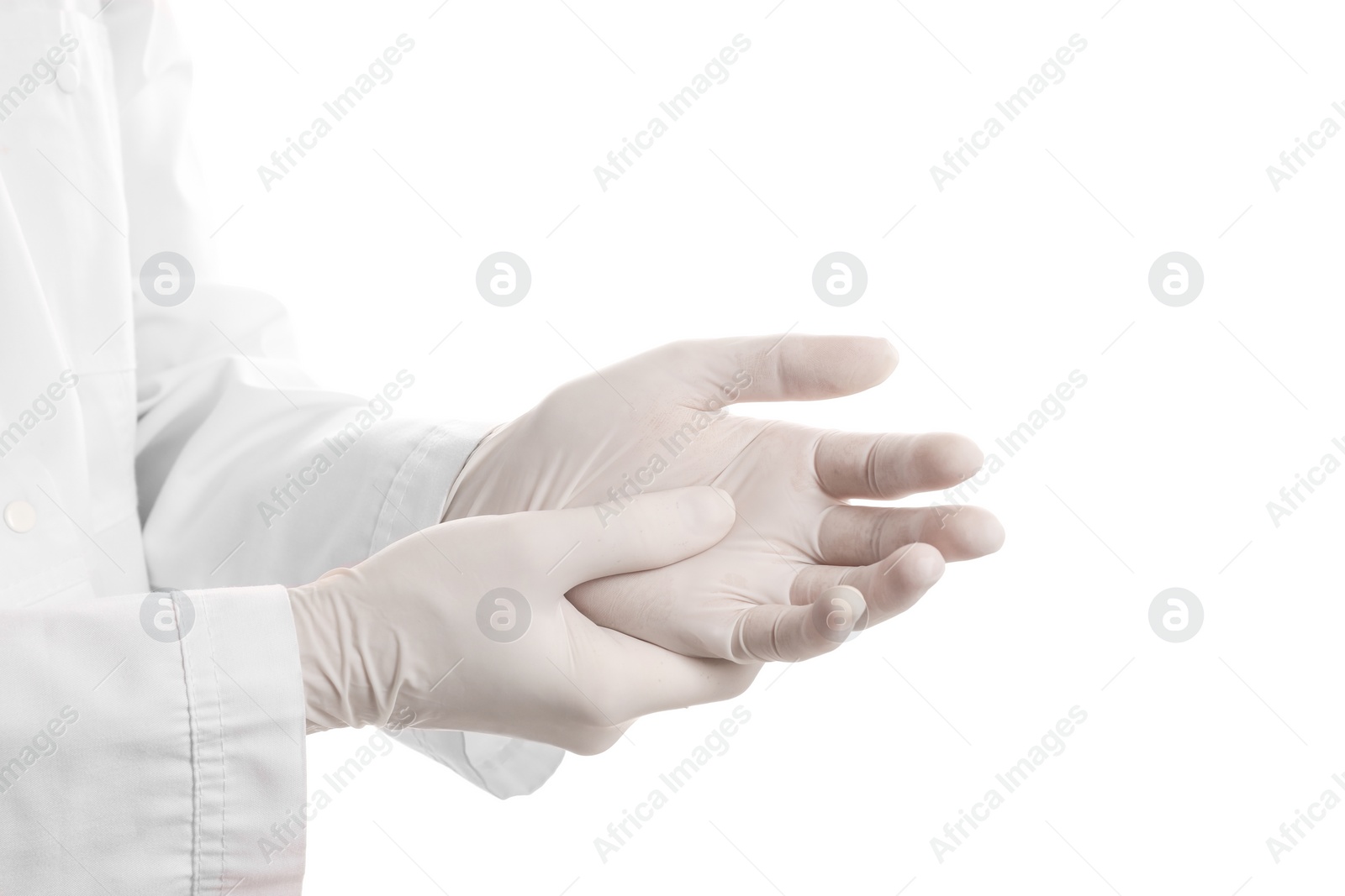 Photo of Doctor wearing medical gloves on white background, closeup