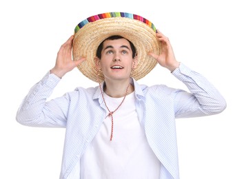 Young man in Mexican sombrero hat on white background