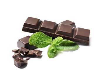 Pieces of dark chocolate with mint on white background