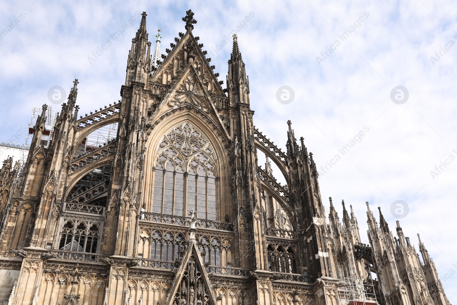 Photo of Cologne, Germany - August 28, 2022: Beautiful old gothic cathedral against blue sky