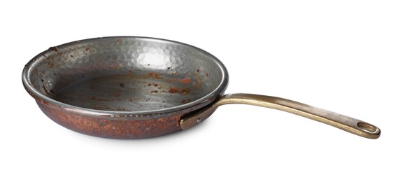 Photo of Dirty old frying pan isolated on white
