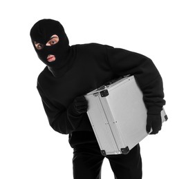 Thief in balaclava with briefcase of money on white background