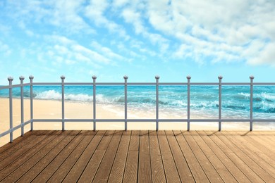 Outdoor wooden terrace revealing picturesque view on ocean shore