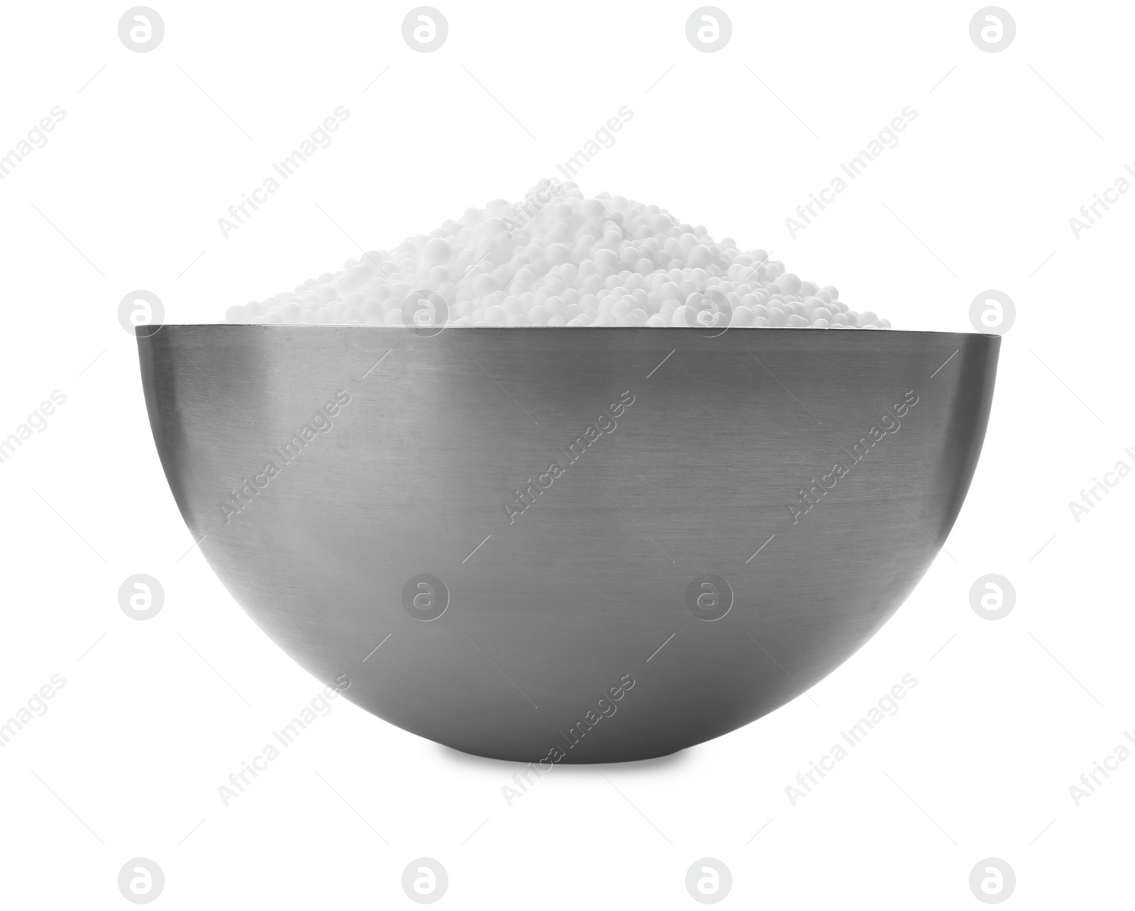 Photo of Pellets of ammonium nitrate in bowl isolated on white. Mineral fertilizer