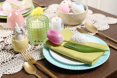 Photo of Festive table setting with beautiful tulip, closeup. Easter celebration