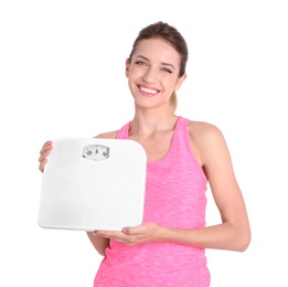 Photo of Young beautiful woman with scales on white background. Weight loss motivation