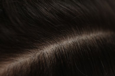 Photo of Man with healthy dark hair, macro view