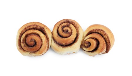 Photo of Tasty fresh cinnamon rolls isolated on white, top view