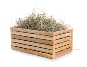 Photo of Dried hay in wooden crate isolated on white