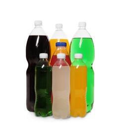 Photo of Bottles of soft drinks on white background