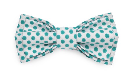 Photo of Stylish bow tie with green polka dot pattern on white background, top view