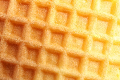 Photo of Delicious waffle for breakfast as background, closeup