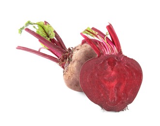 Photo of Whole and cut ripe beetroots on white background