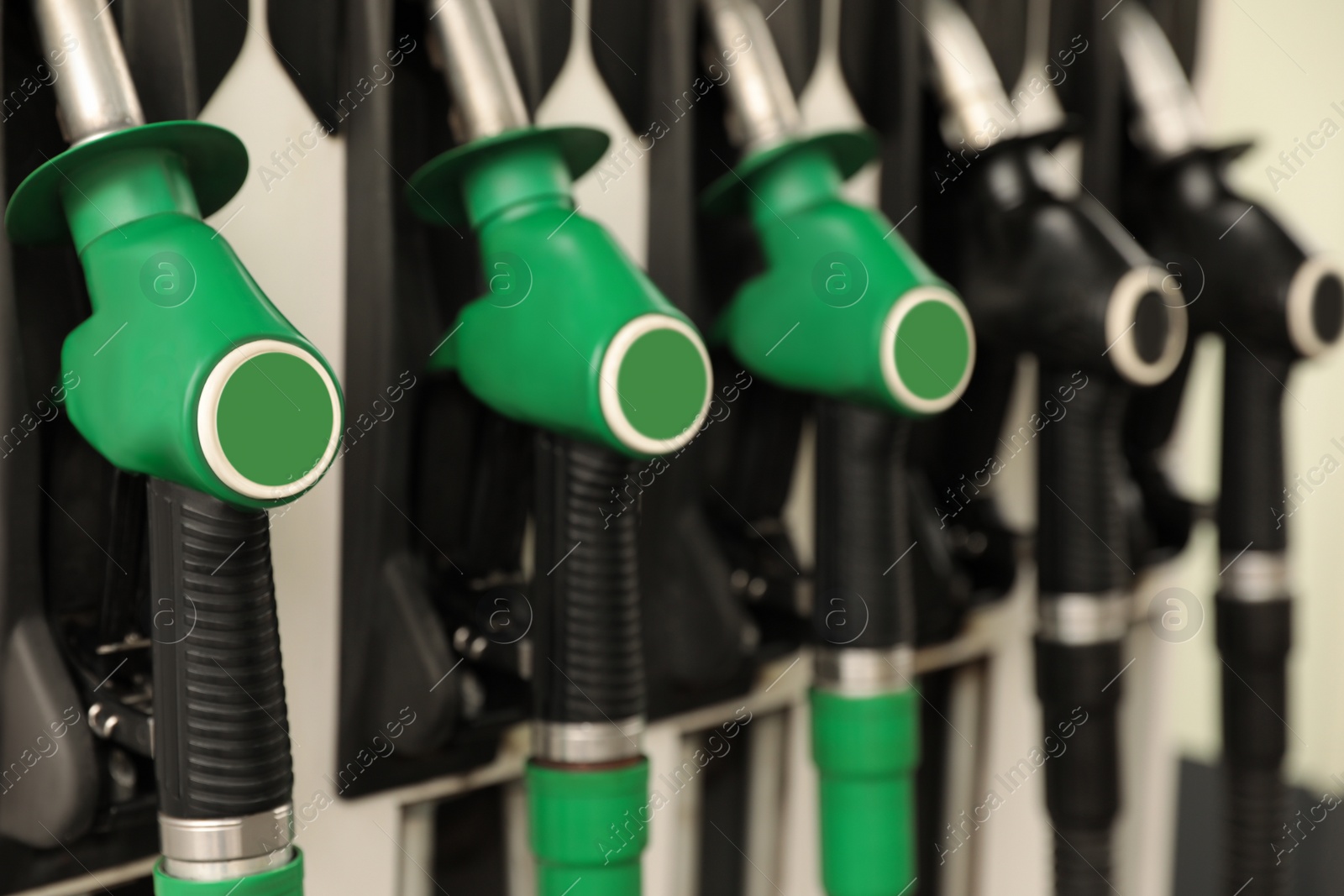 Photo of Gasoline pump at modern gas filling station, closeup