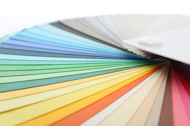 Photo of Color palette samples on white background, closeup