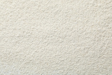 Photo of Oat flour as background, top view. Gluten free product