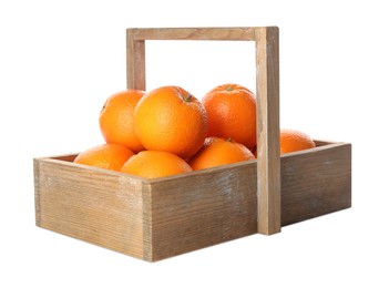 Photo of Fresh ripe oranges in wooden crate on white background