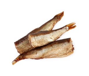 Photo of Tasty canned sprats isolated on white, top view