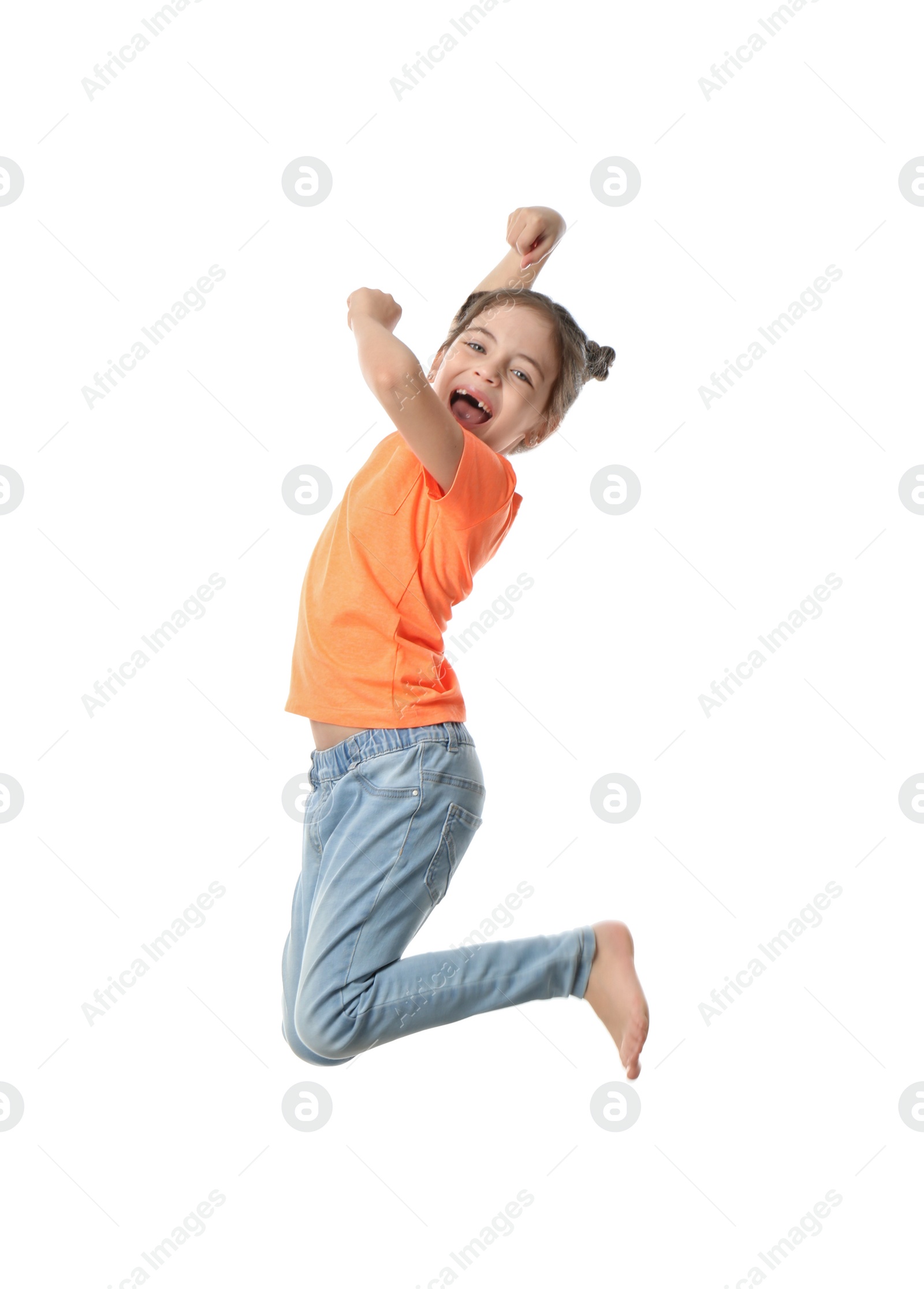 Photo of Cute little girl jumping on white background