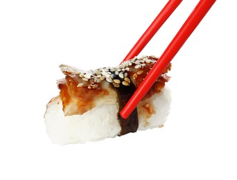 Photo of Chopsticks with delicious nigiri sushi isolated on white