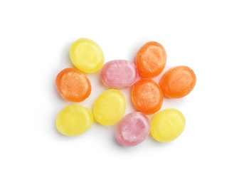 Photo of Delicious colorful candies on white background, top view