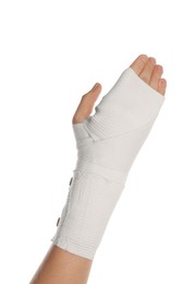 Photo of Woman with hand wrapped in medical bandage on white background, closeup