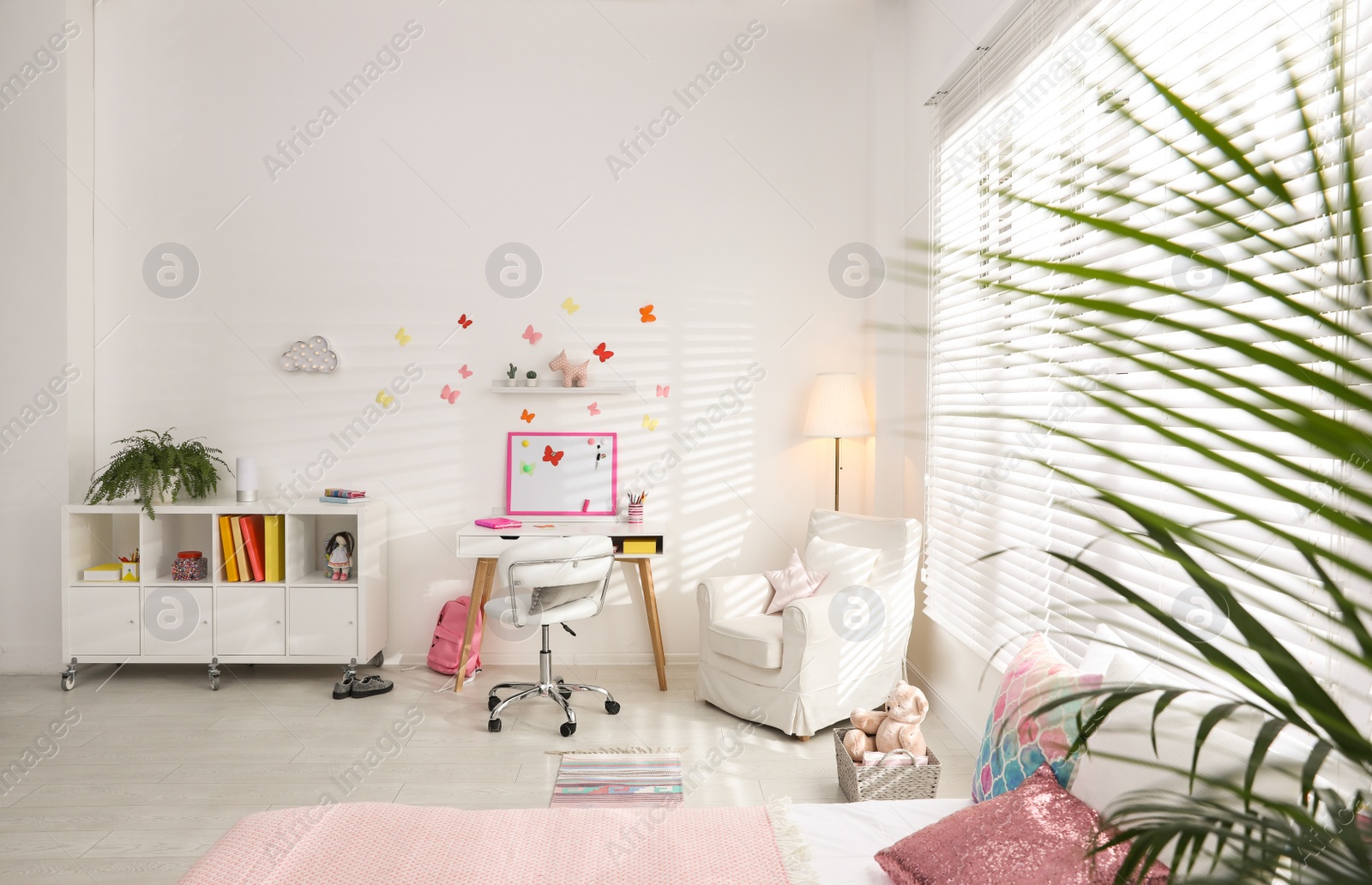 Photo of Modern child room interior with stylish furniture