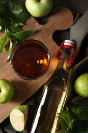 Photo of Flat lay composition with delicious apple cider on table