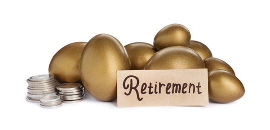Photo of Many golden eggs, coins and card with word Retirement on white background. Pension concept