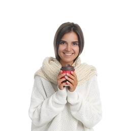 Photo of Happy beautiful woman with paper cup of mulled wine on white background