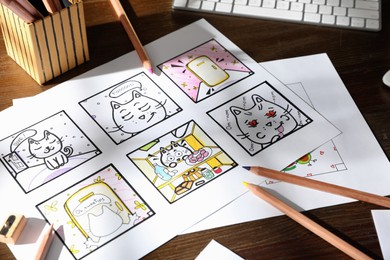 Photo of Storyboard with cartoon sketches at workplace. Pre-production process