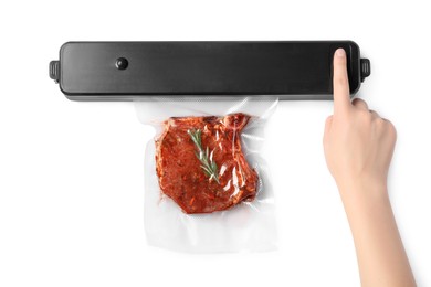 Photo of Woman using sealer for vacuum packing and plastic bag with meat steak, rosemary on white background