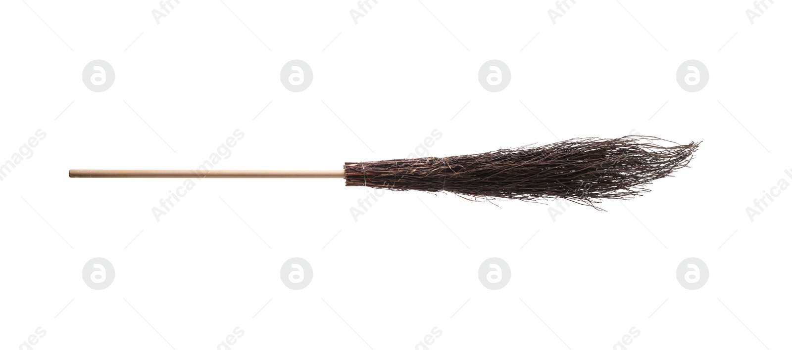 Photo of Old broom with wooden handle isolated on white