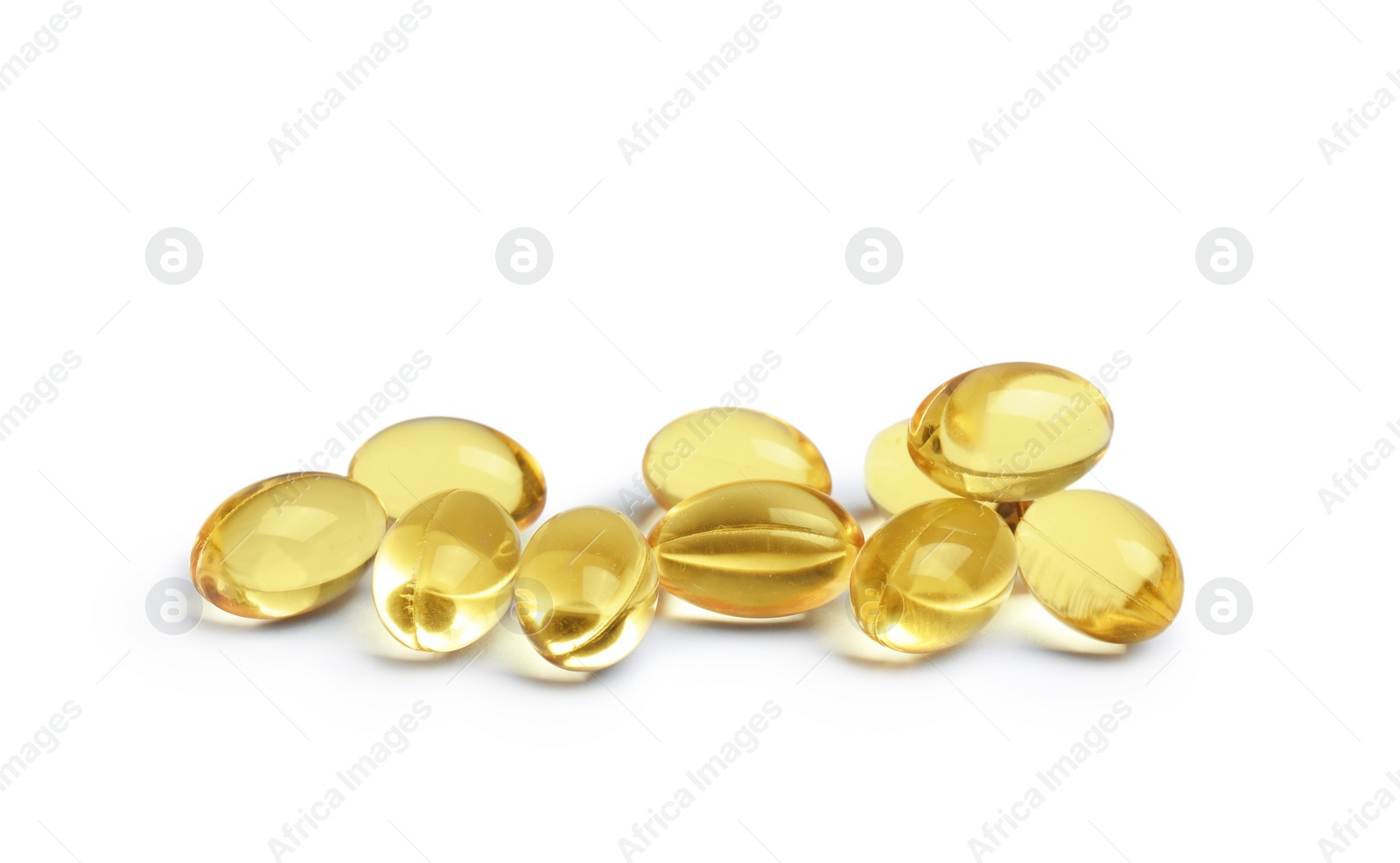 Photo of Cod liver oil pills on white background