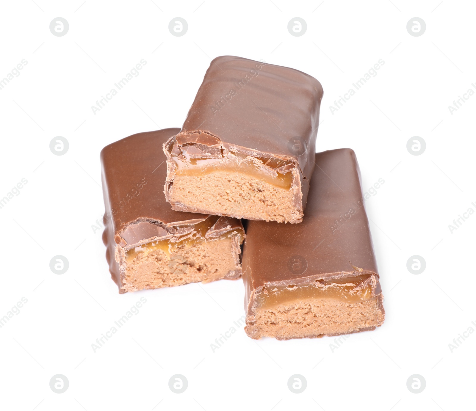 Photo of Pieces of tasty chocolate bars with nougat on white background