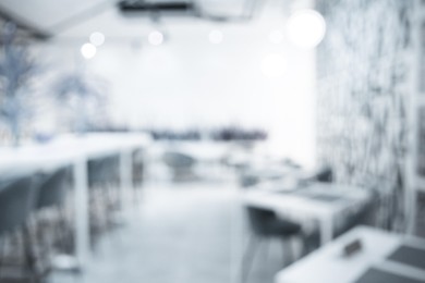 Image of Office interior. Blurred view of comfortable workspace