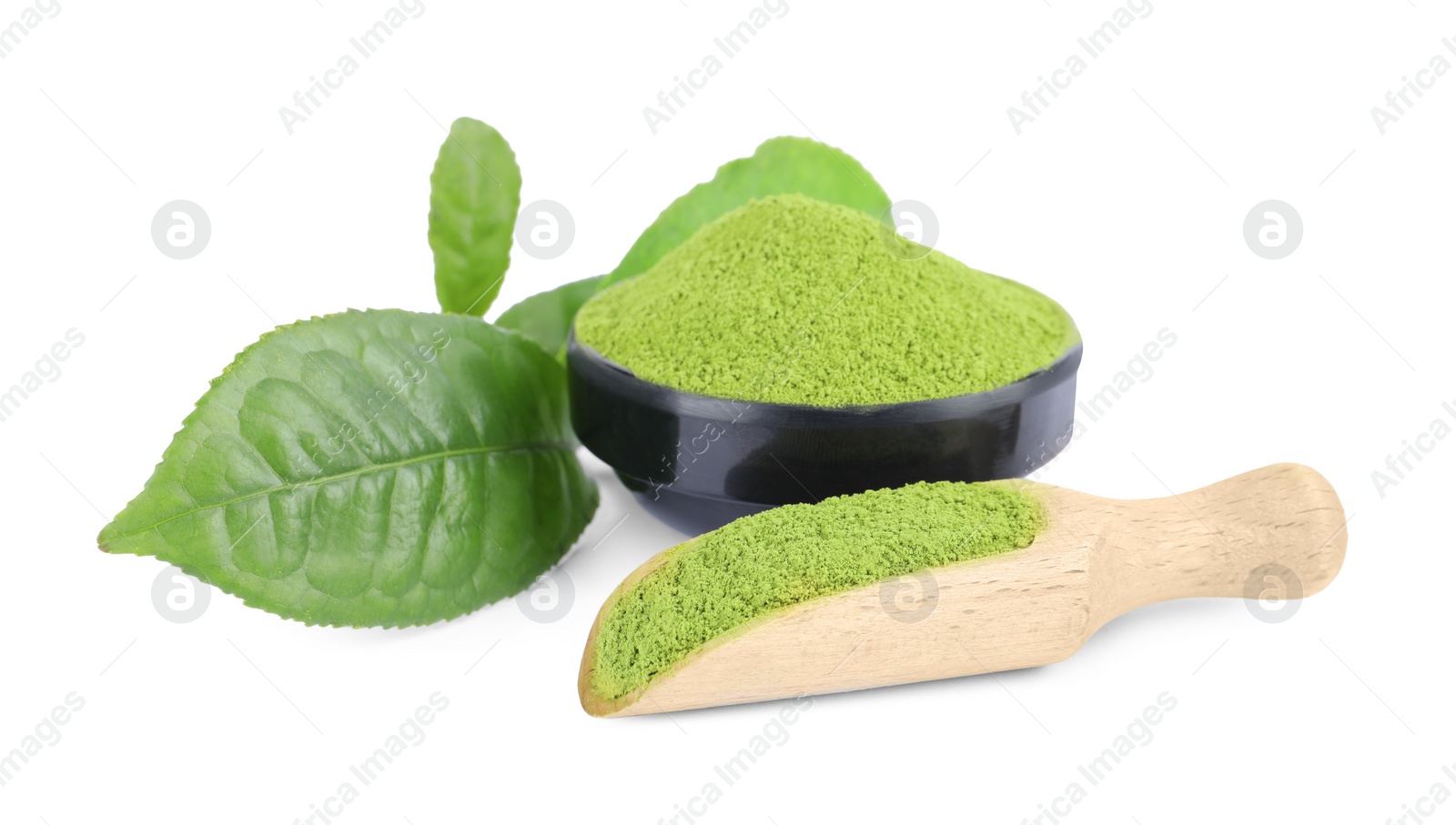 Photo of Bowl and scoop with green matcha powder isolated on white