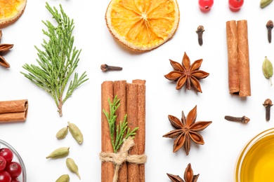 Composition with mulled wine ingredients on white background, top view