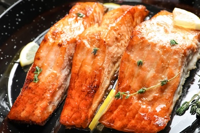 Dish with tasty freshly cooked salmon, closeup