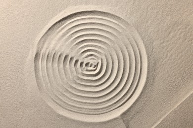 Beautiful spiral on sand, top view. Zen garden