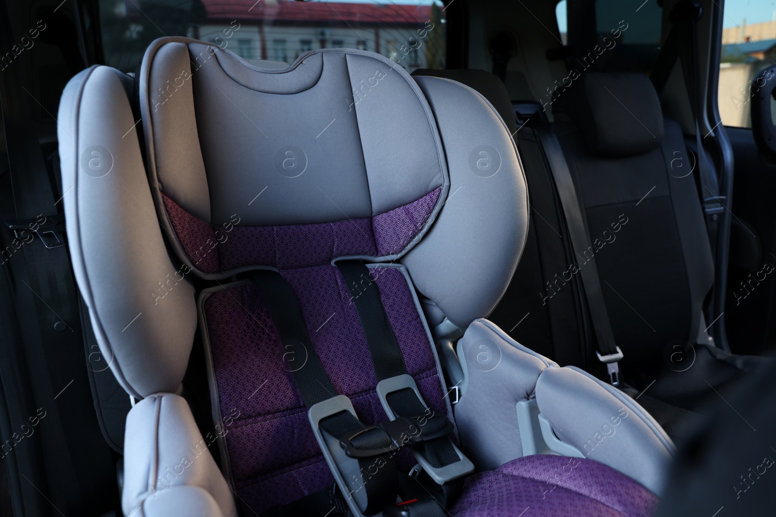 Photo of Empty modern child safety seat inside car