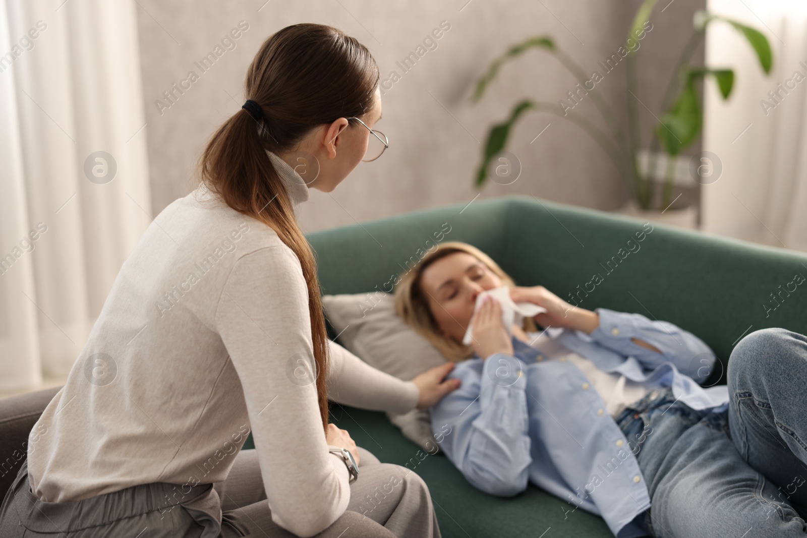 Photo of Professional psychotherapist working with patient in office